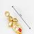 Traditional kundan drop earrings with red accent