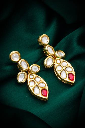 Traditional kundan drop earrings with red accent