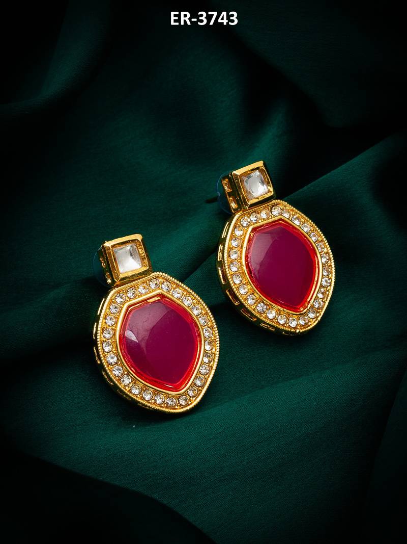 Pink stone stud kundan earrings with ad