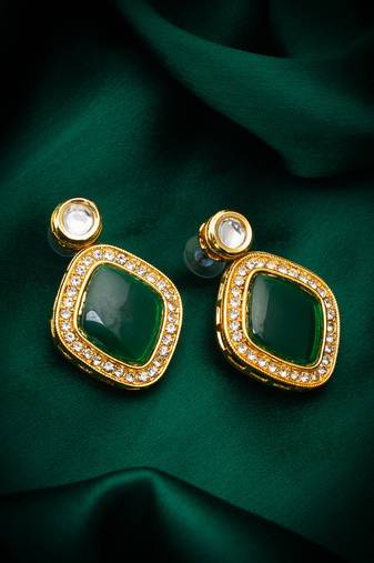 green stone gold tone stud earrings with crystal