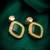 green stone gold tone stud earrings with crystal
