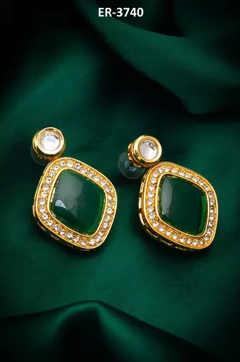 green stone gold tone stud earrings with crystal