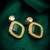 green stone gold tone stud earrings with crystal