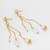 gold-tone multi-chain tassel earrings