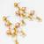 gold-tone multi-pearl chandelier earrings with pearl drops