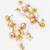 gold-tone multi-pearl chandelier earrings with pearl drops