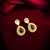 gold-plated stud earrings with green stone and crystal