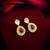 gold-plated stud earrings with green stone and crystal