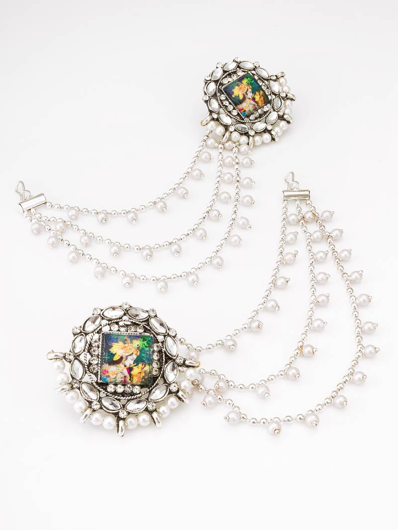 silver oxidized radha krishna earrings with pearl drop chains