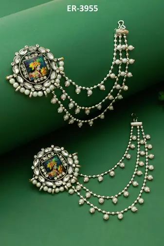 silver oxidized radha krishna earrings with pearl drop chains