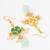 green floral drop earrings with pearl clusters