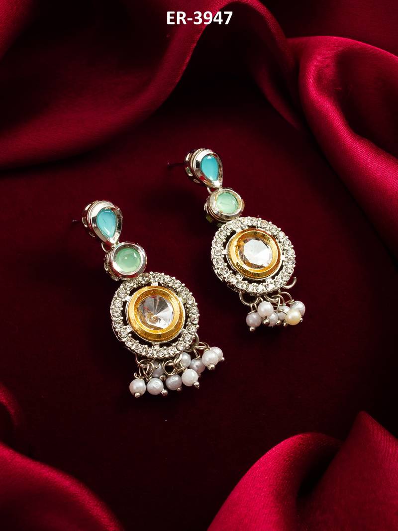 silver-toned drop earrings with pearl dangles