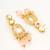 gold plated peach drop earrings