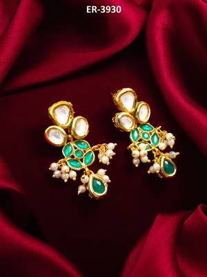 emerald green kundan and pearl drop earrings 1