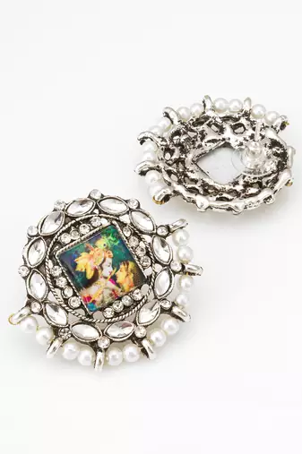silver toned radha krishna temple work kundan stud earrings