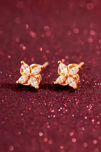 floral american diamond gold stud earrings