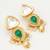 gold-plated kundan and green stone earrings with pearl and kundan drops