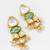 gold-toned kundan earrings with meenakari and pearl drops