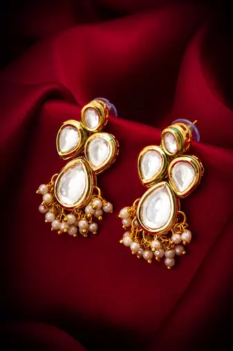 gold-plated kundan earrings with pearl cluster drops
