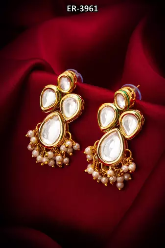 gold-plated kundan earrings with pearl cluster drops