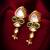 gold-toned kundan and green stone drop earrings with pearl
