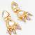 gold-plated kundan earrings with crystal bead drop