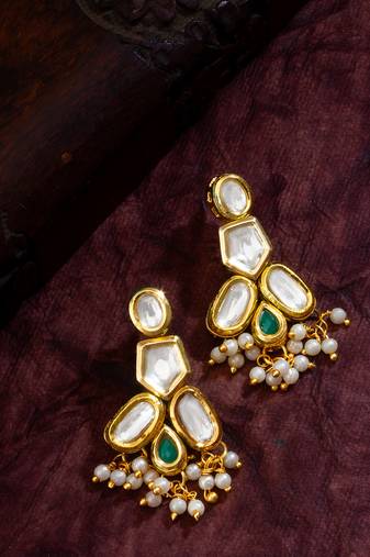 gold-plated kundan earrings with green stone and pearl drops