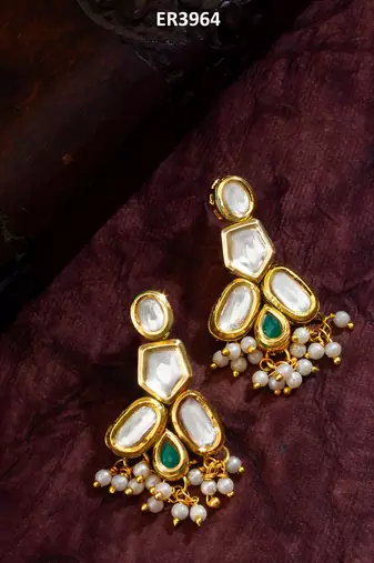 gold-plated kundan earrings with green stone and pearl drops