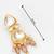 gold-plated kundan earrings with crystal bead drop