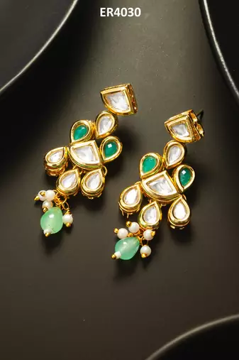 gold-plated kundan earrings with stones and drop