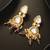 gold-plated kundan earrings with crystal bead drop