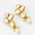 Classic gold-plated oval kundan earrings with oversized pearl drops