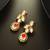 gold-plated kundan dangle earrings with drop