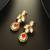 gold-plated kundan dangle earrings with drop