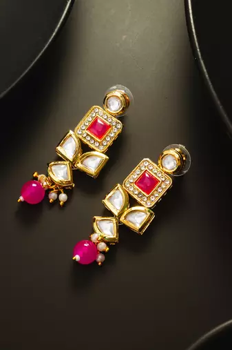 Geometric gold-plated kundan long drop earrings with pink accents and pearl beads