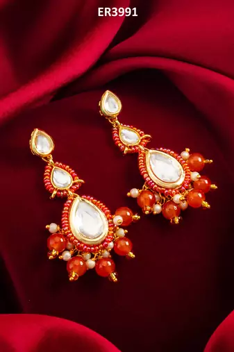 orange kundan drop earrings with beads and pearl