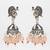 oxidized silver peacock jhumka earrings with peach crystal beads