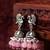 oxidized silver peacock jhumka earrings with rose pink jade-style beads and pearl clusters