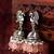 oxidized silver peacock jhumka earrings with peach crystal beads