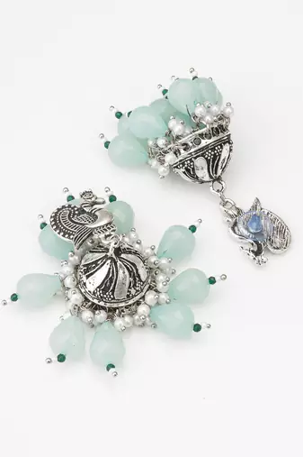 oxidized silver peacock jhumka earrings with mint green beads and pearl