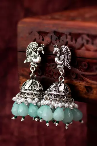 oxidized silver peacock jhumka earrings with mint green beads and pearl