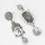 oxidized silver buddha face drop earrings with grey stone pendant