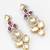 dual-tone ruby red and kundan studded traditional dangler earrings