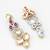 dual-tone ruby red and kundan studded traditional dangler earrings