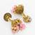 peacock motif pink beaded gold plated jhumka earrings