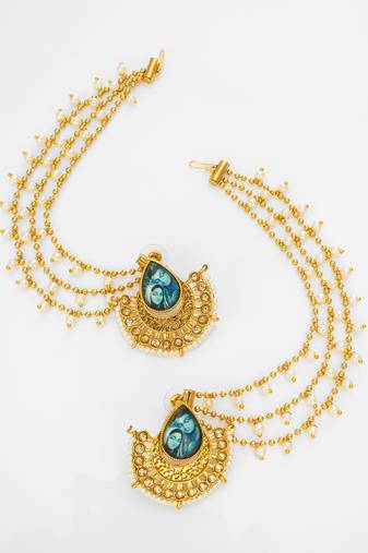gold-toned earrings with removable ear chain