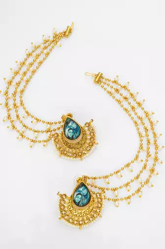 gold-toned earrings with removable ear chain