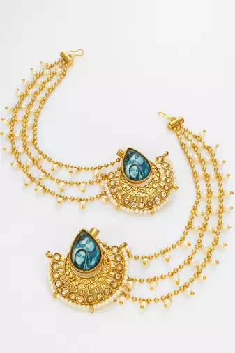 gold-toned earrings with removable ear chain