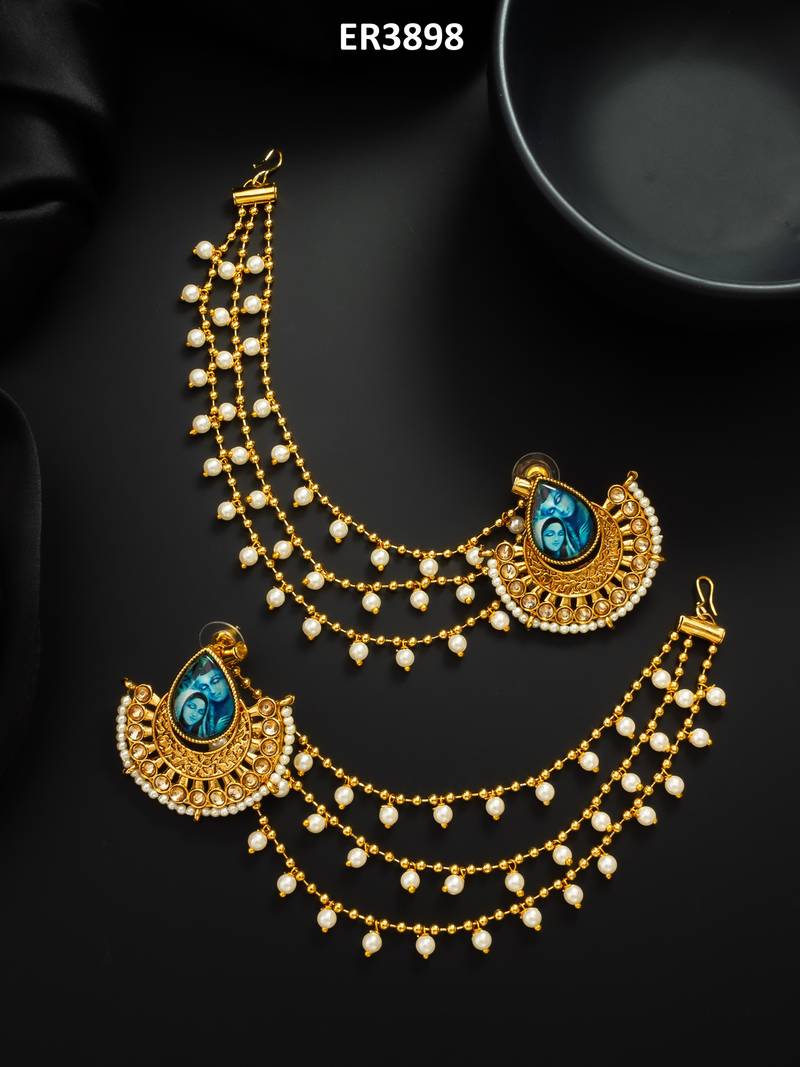 gold-toned earrings with removable ear chain
