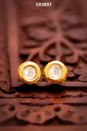 gold plated white round stud earrings with kundan stones